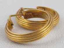 Appraisal: A pair of yellow metal tests ct gold hoop earrings