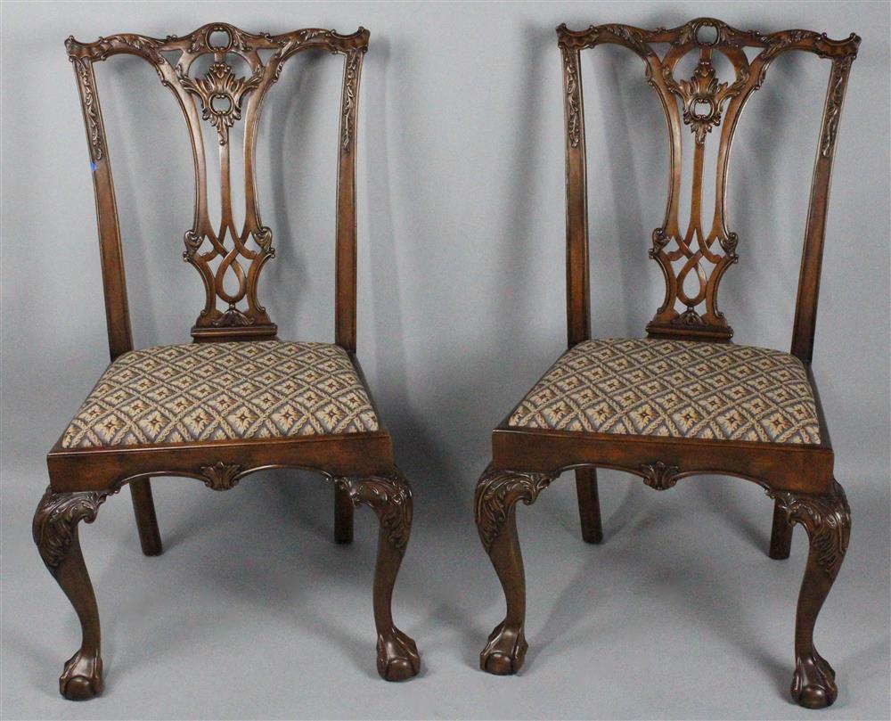 Appraisal: TWO CHIPPENDALE STYLE MAHOGANY CHAIRS with shaped crest rail above