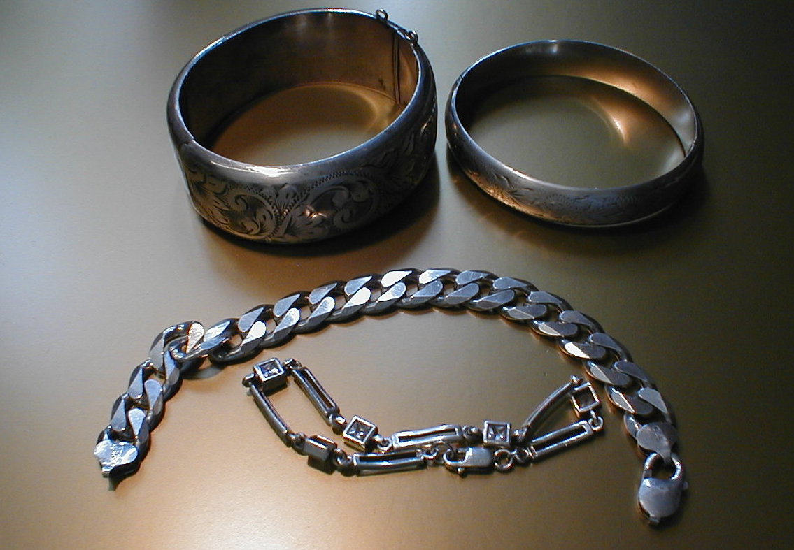 Appraisal: Assorted silver jewellery comprising of two bangles and two bracelets