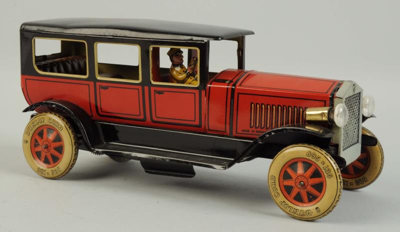 Appraisal: German Tin Litho Wind-Up Tippco Limousine Original lithographed driver Marked