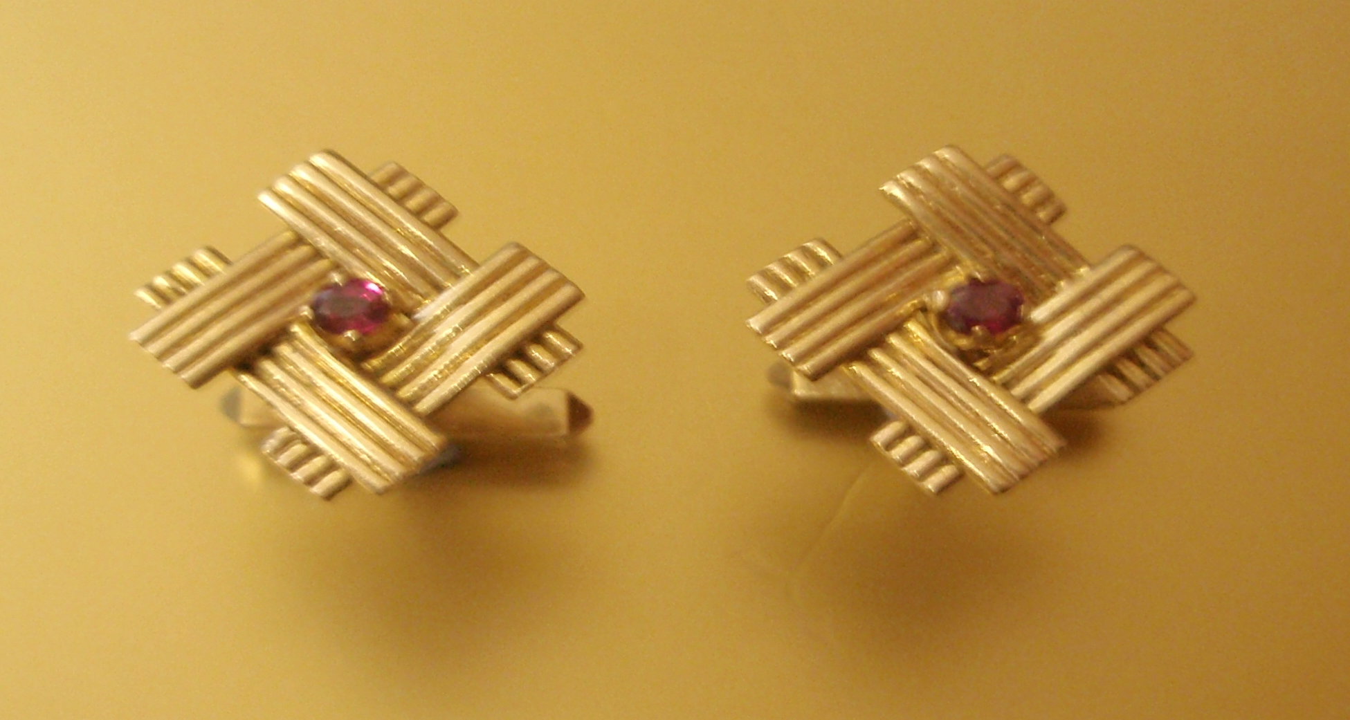 Appraisal: A pair of ct gold cufflinks set with a central