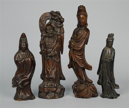 Appraisal: FOUR CHINESE CARVED WOOD FIGURES OF DIETYS height of tallest