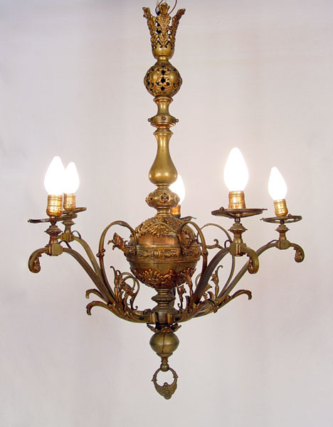 Appraisal: ORNATE BRASS CHANDELIER light electric Note staining to brass and