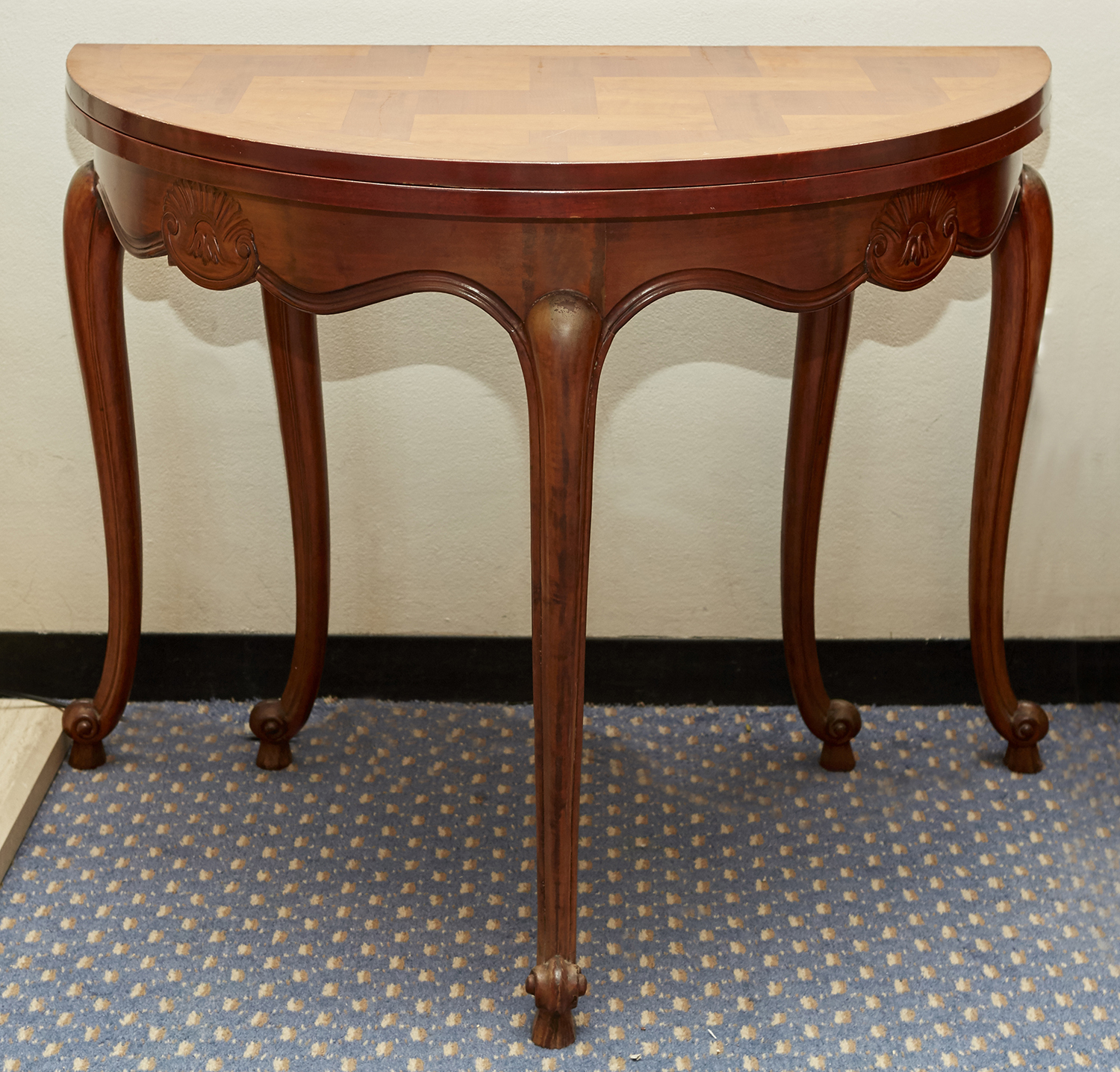 Appraisal: A CONTINENTAL PARQUETRY TOPPED FOLD OUT CONSOLE CENTRE TABLE With