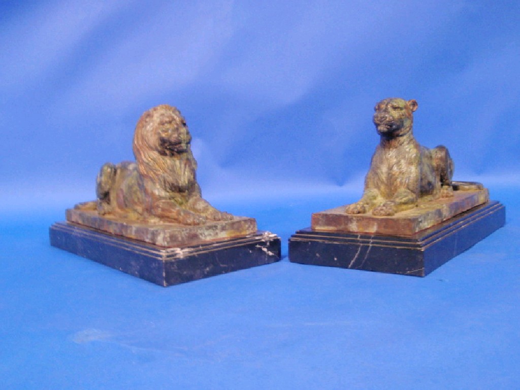 Appraisal: After C Knight A pair of green patinated bronze figures