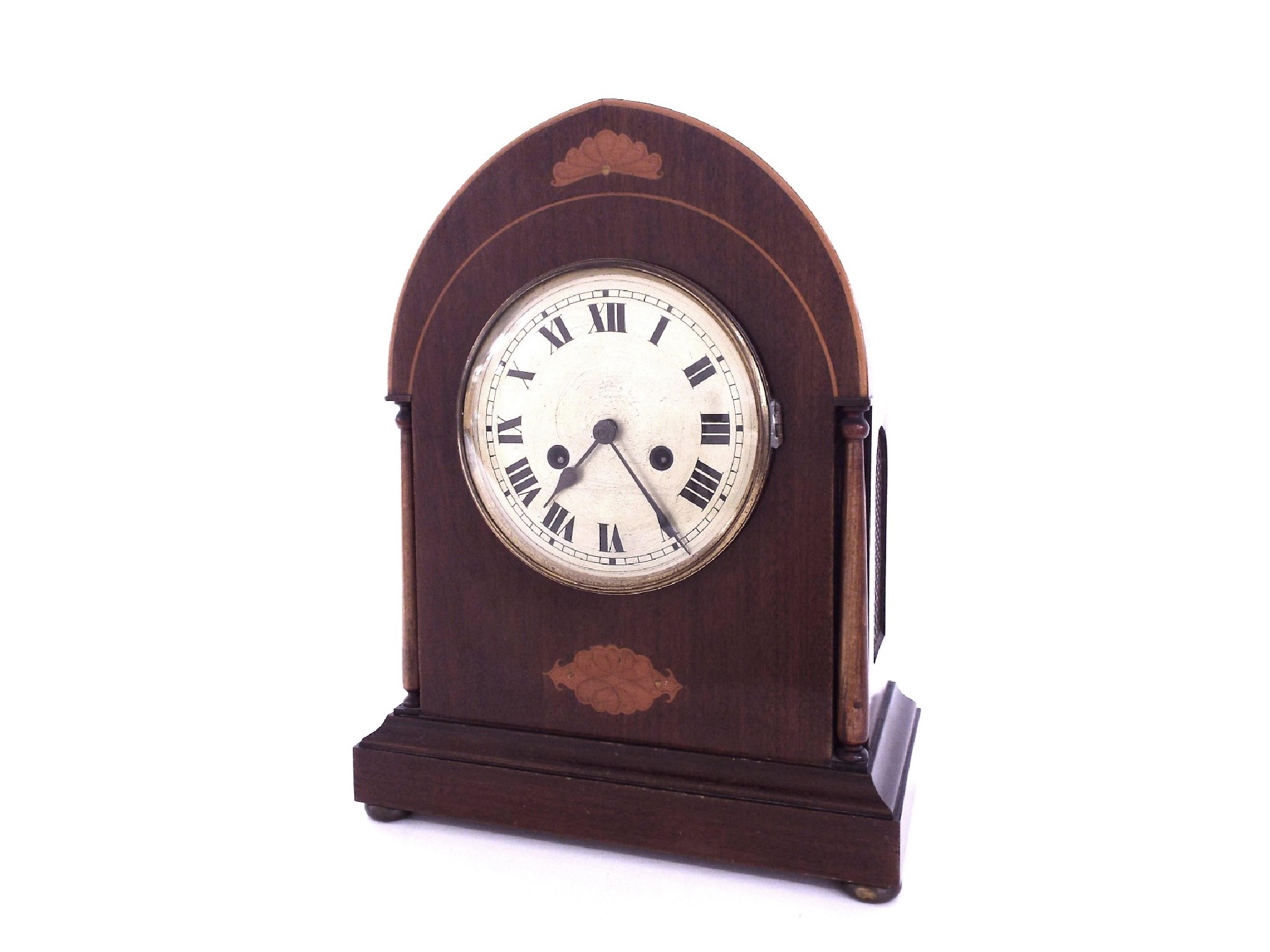 Appraisal: Mahogany inlaid lancet two train mantel clock striking on a