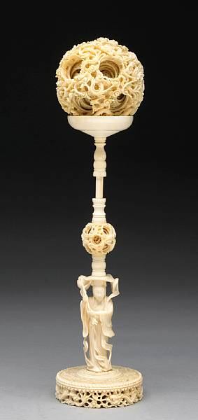 Appraisal: An ivory puzzle ball and stand The stand carved with