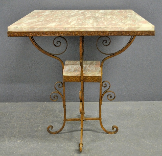 Appraisal: - Art Deco wrought iron side table with a pink