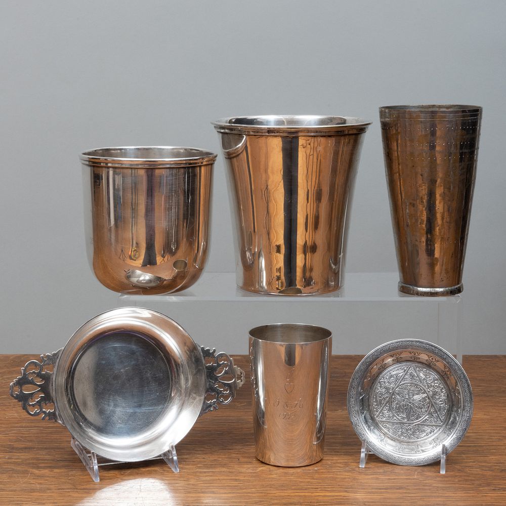 Appraisal: English Silver Beakers and a Group of Vessels The beaker