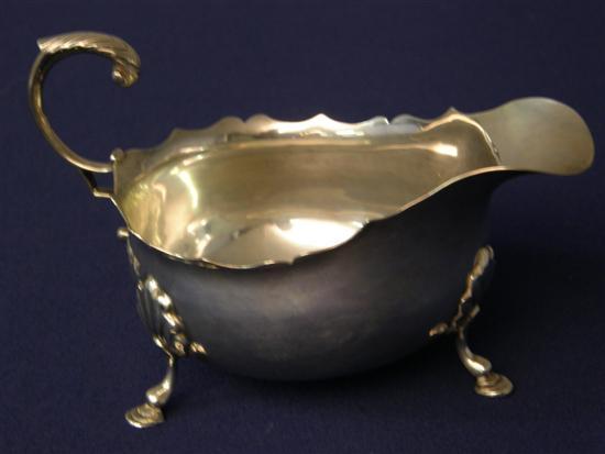 Appraisal: Victorian silver sauce boat Chester ozs h w in