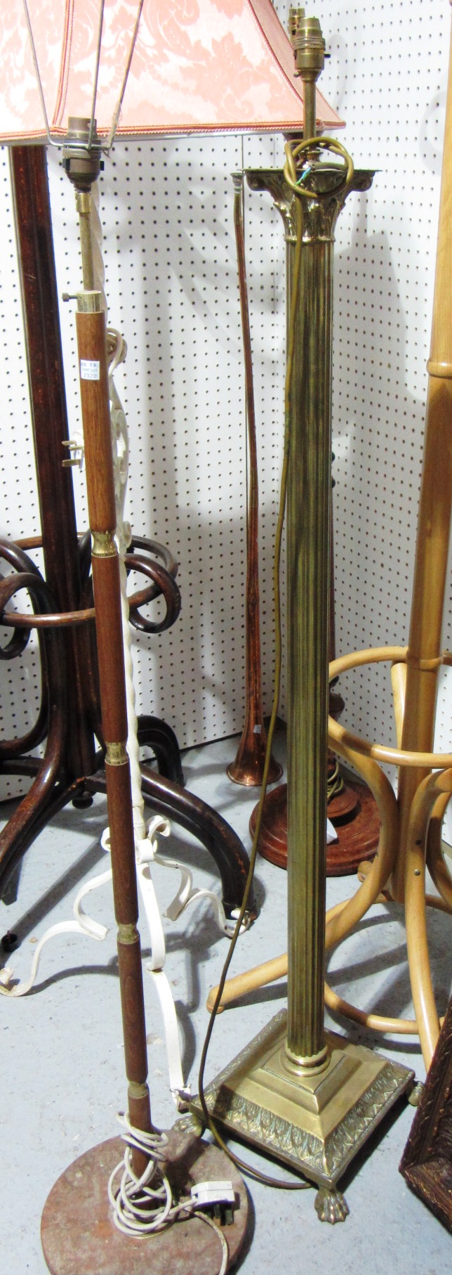 Appraisal: A th century brass Corinthian column standard lamp and a