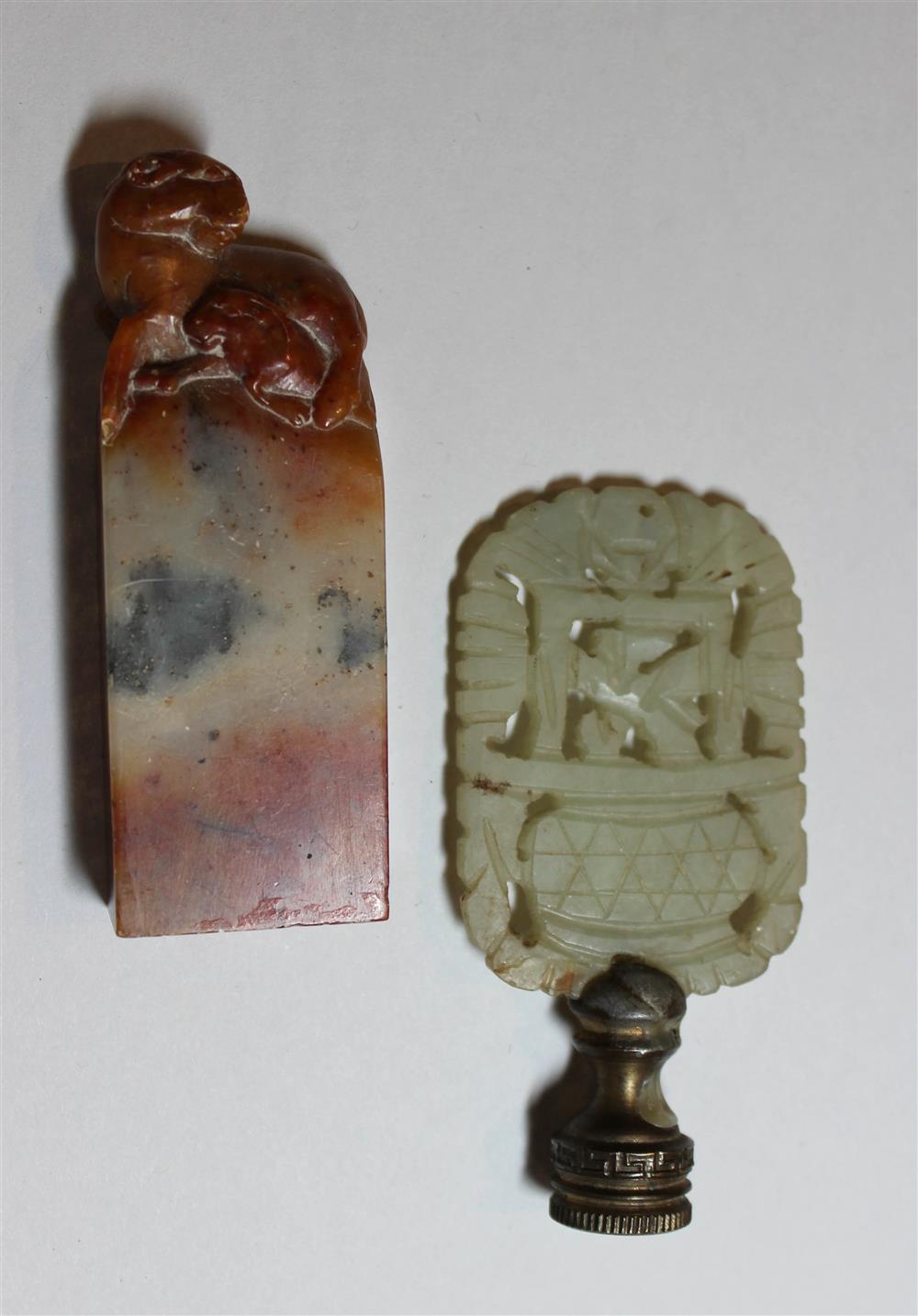 Appraisal: TWO CHINESE HARDSTONES including an oval serpentine carving now mounted