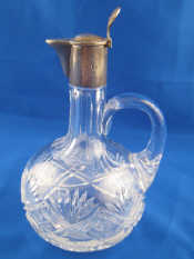 Appraisal: A Russian silver mounted small cut glass lidded jug B