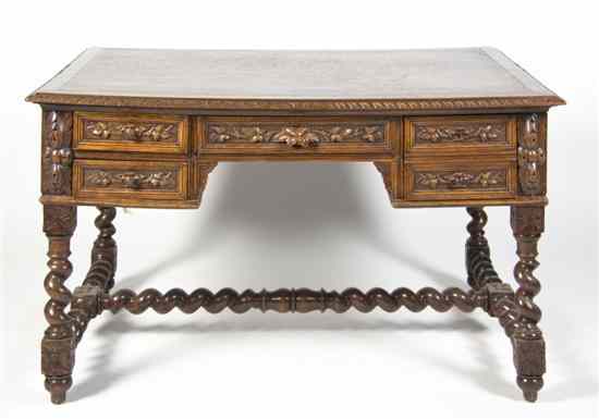 Appraisal: A Carved Wood Partner's Desk the rectangular top having a