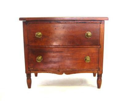 Appraisal: Miniature Federal stained chestA molded rectangular top above two drawers