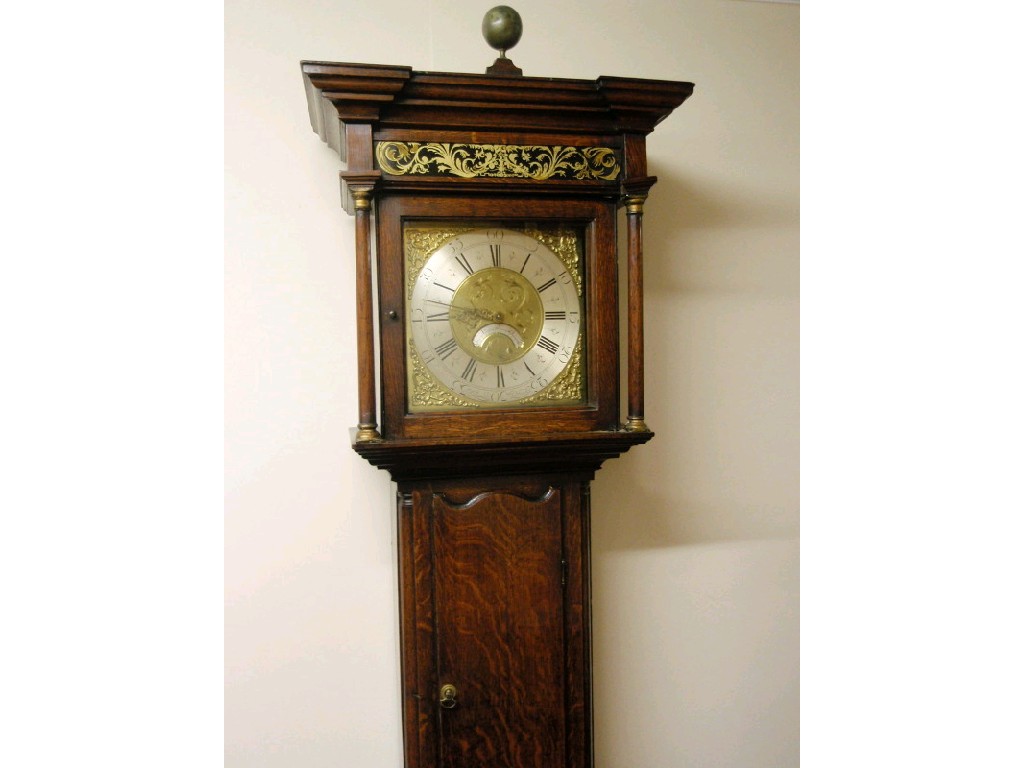 Appraisal: A mid- thC oak longcase clock with moulded pillar hood