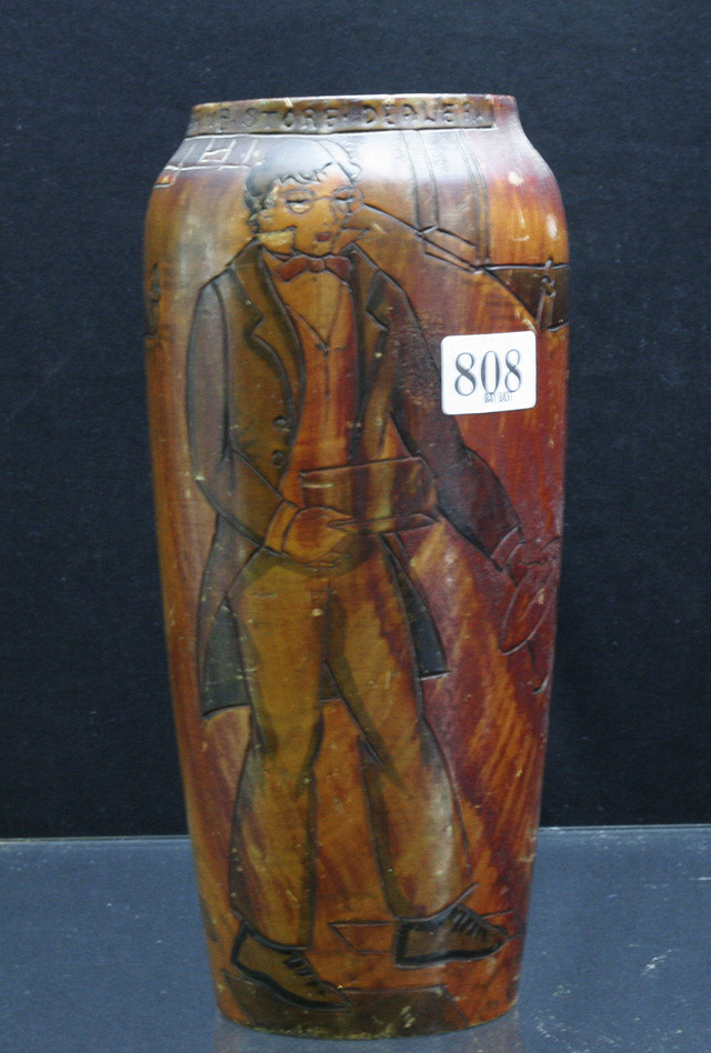 Appraisal: An Australian poker work flower vase 'Marine Store Dealer' cms