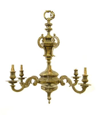 Appraisal: A brass six light electrolier with scroll branches and an