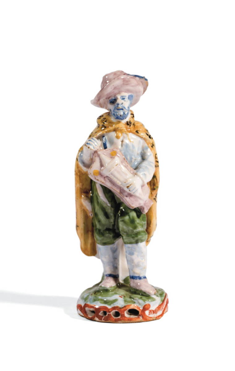 Appraisal: DUTCH DELFT POLYCHROME FIGURE OF A CLOAKED GENTLEMAN EIGHTEENTH CENTURY