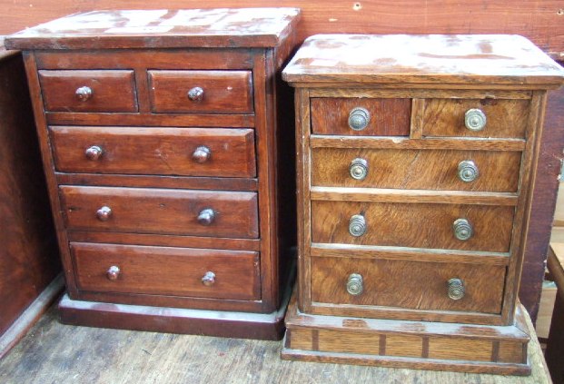 Appraisal: A miniature oak chest of two short over three long