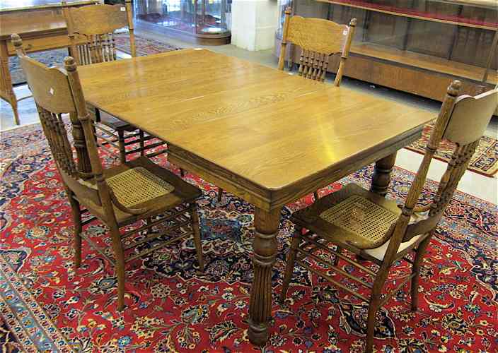 Appraisal: LATE VICTORIAN OAK DINING TABLE AND FOUR CHAIRS American late