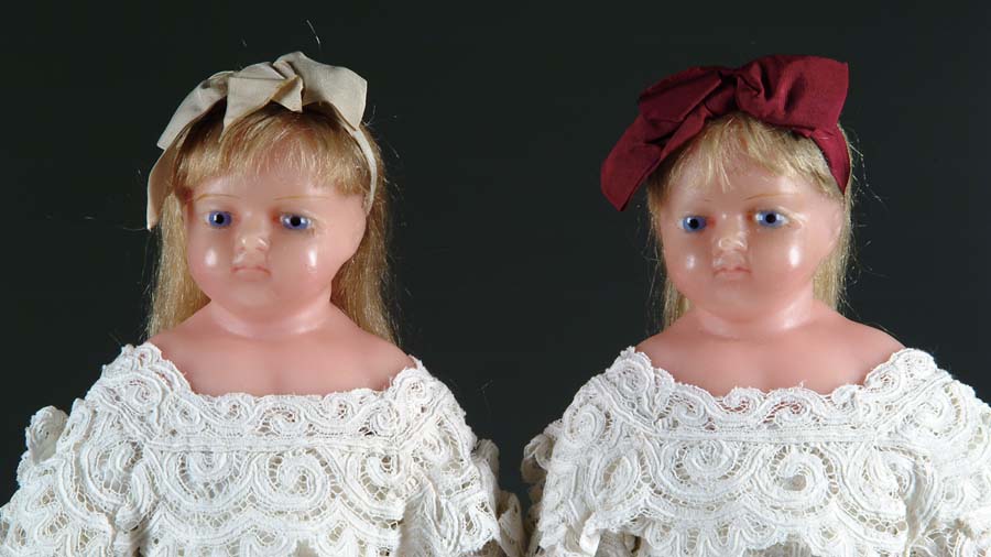 Appraisal: LOT OF TWO ENGLISH POURED WAX SHOULDER HEAD DOLLS IN