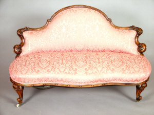 Appraisal: A Victorian mahogany two seater settee th century the shaped