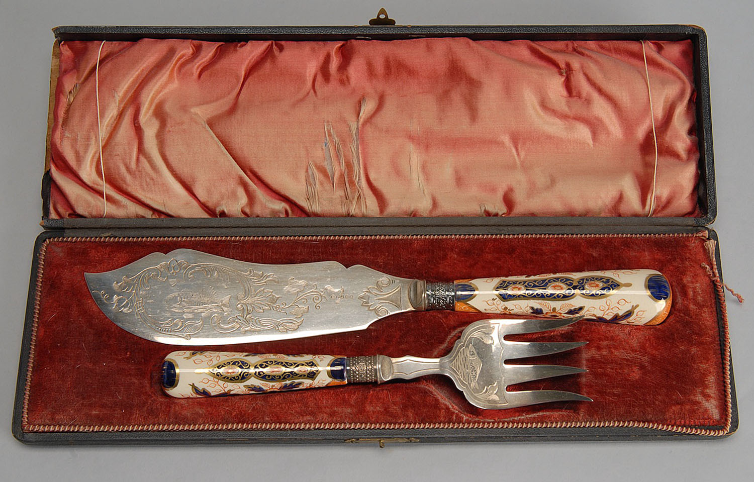 Appraisal: TWO-PIECE ROYAL CROWN DERBY FISH SERVING SET Knife and fork