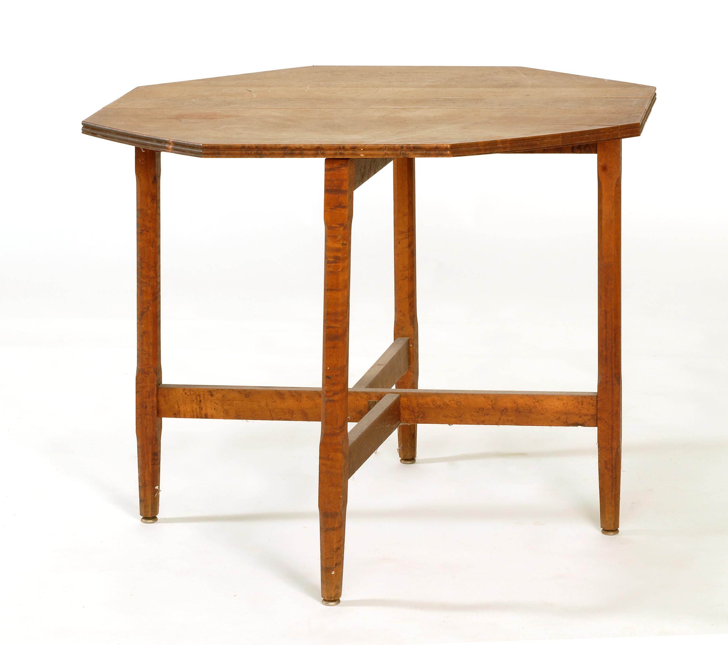 Appraisal: EARLY-TO-MID TH CENTURY TUCK-AWAY TABLE in bird's-eye maple with octagonal