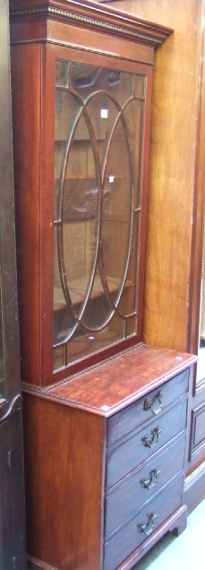 Appraisal: A th century mahogany bookcase cabinet the top with astragal