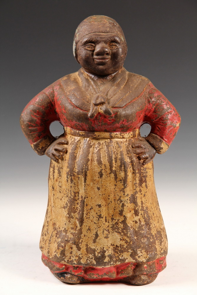 Appraisal: CAST IRON FIGURAL DOORSTOP - African-American Mammy Door Stop in