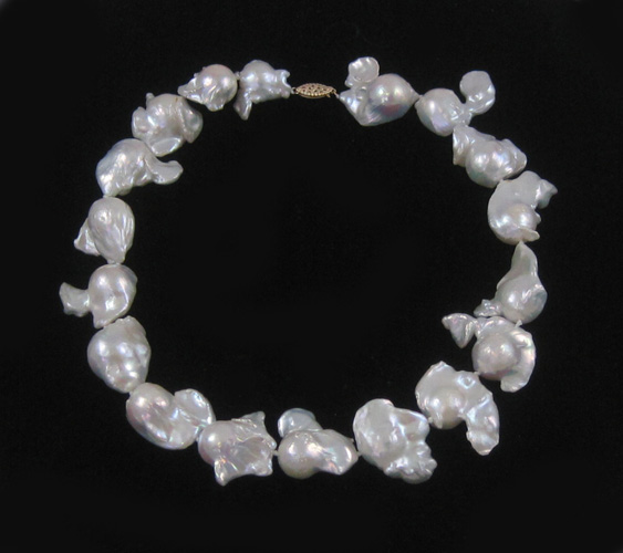 Appraisal: PRINCESS LENGTH BAROQUE PEARL NECKLACE WITH FOURTEEN KARAT GOLD CLASP