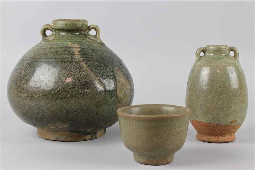 Appraisal: A CHINESE CELADON CUP AND TWO SAWANKHALOK JARS the Chinese