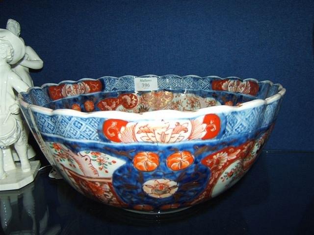 Appraisal: A Japanese Imari bowl of lobed form painted with panels