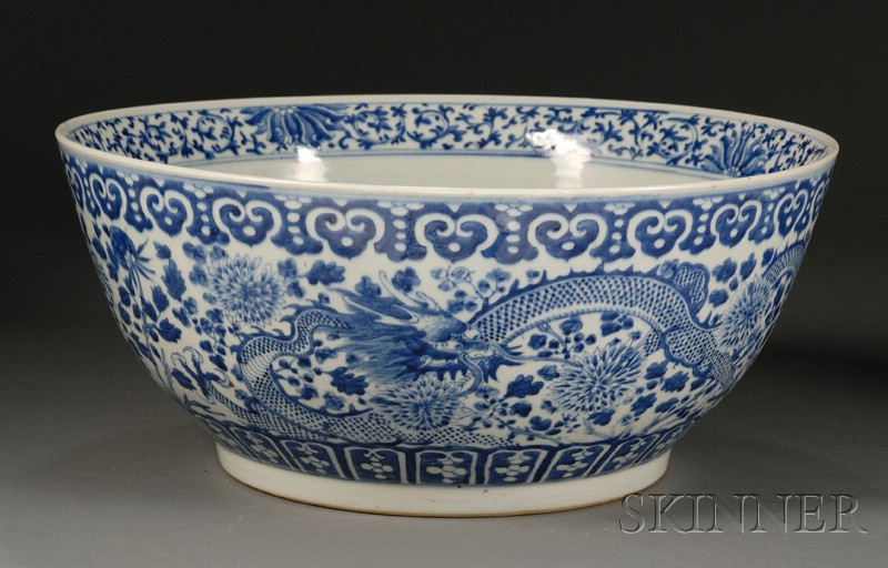 Appraisal: Porcelain Bowl China th century underglaze blue designs of dragons