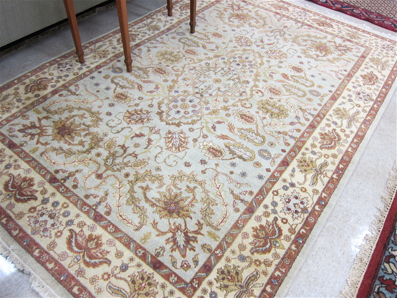 Appraisal: HAND KNOTTED ORIENTAL CARPET Indo-Persian overall floral tracery pattern on