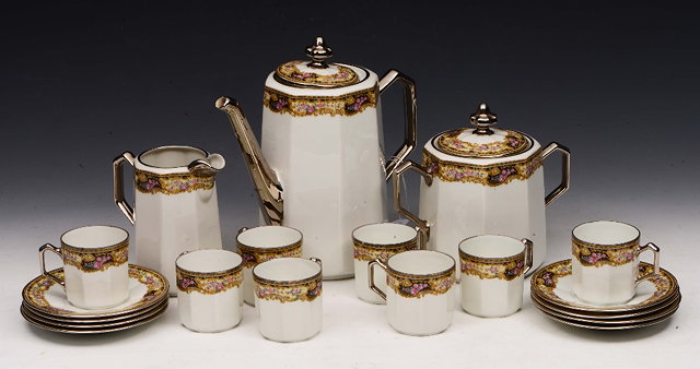 Appraisal: A LIMOGES PORCELAIN COFFEE SERVICE consisting of nineteen pieces including