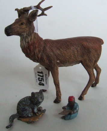 Appraisal: A hollowcast lead cat a hollowcast lead stag and a