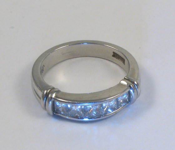 Appraisal: DIAMOND AND PLATINUM RING with insurance replacement certificate The ring