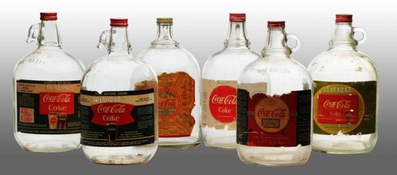 Appraisal: Lot of Coca-Cola -Gallon Syrup Jugs Description s to s