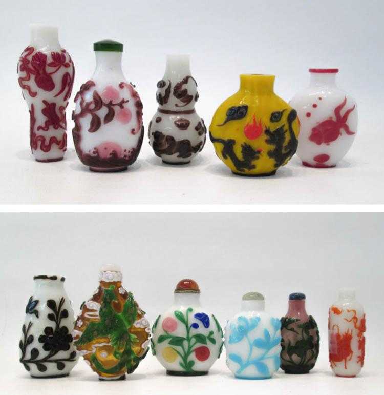 Appraisal: ELEVEN CHINESE PEKING GLASS SNUFF BOTTLES individually cameo carved in