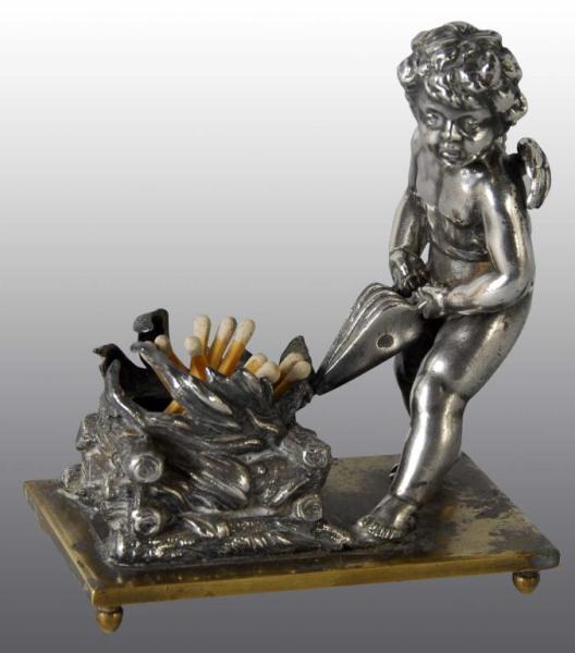 Appraisal: Winged Cherub Figural Match Stick Holder Description No damage or