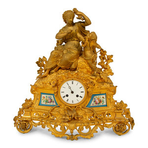 Appraisal: A Louis XV Style Gilt Bronze and Porcelain Inset Mantel