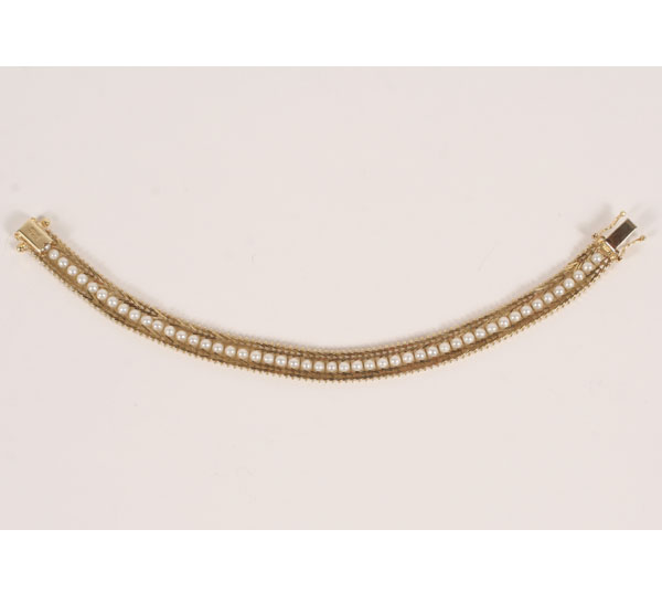 Appraisal: Gold K rivet link bracelet set with mm cultured pearls