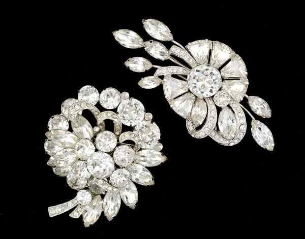 Appraisal: Eisenberg Brooch Collection Two Eisenberg rhinestone brooches all signed pieces