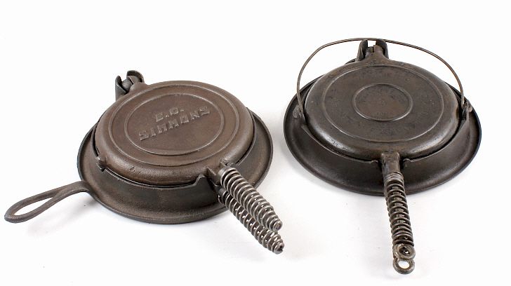 Appraisal: Wagner and E C Simmons Waffle Irons with bases This