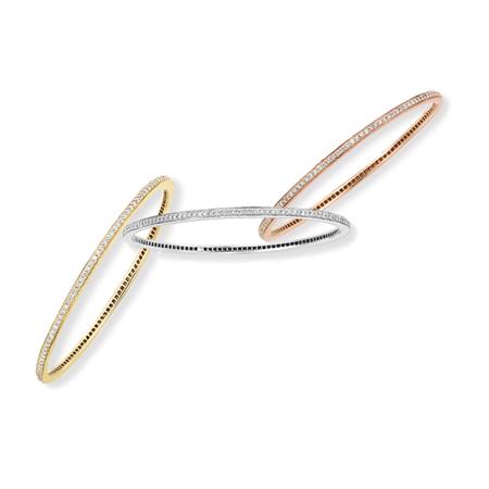 Appraisal: Three Tricolor Gold and Diamond Bangles Estimate -