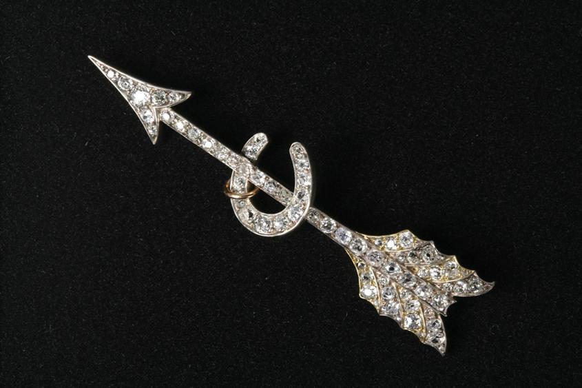 Appraisal: A VICTORIAN DIAMOND-SET BROOCH in the form of Cupids arrow