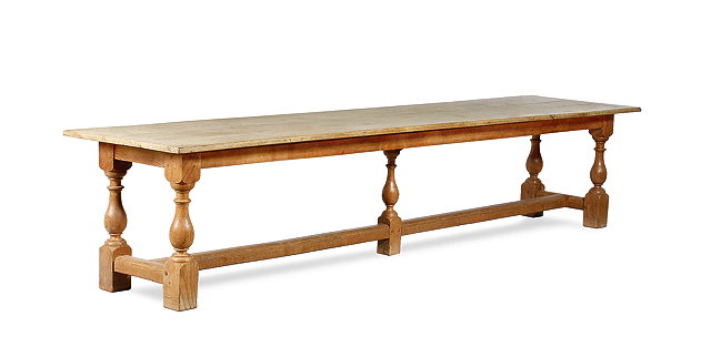 Appraisal: AN OAK REFECTORY DINING TABLE BY GUY DAWBER the rectangular