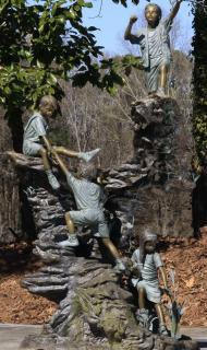 Appraisal: Bronze sculpture kids at play h Patinated and polychrome decorated